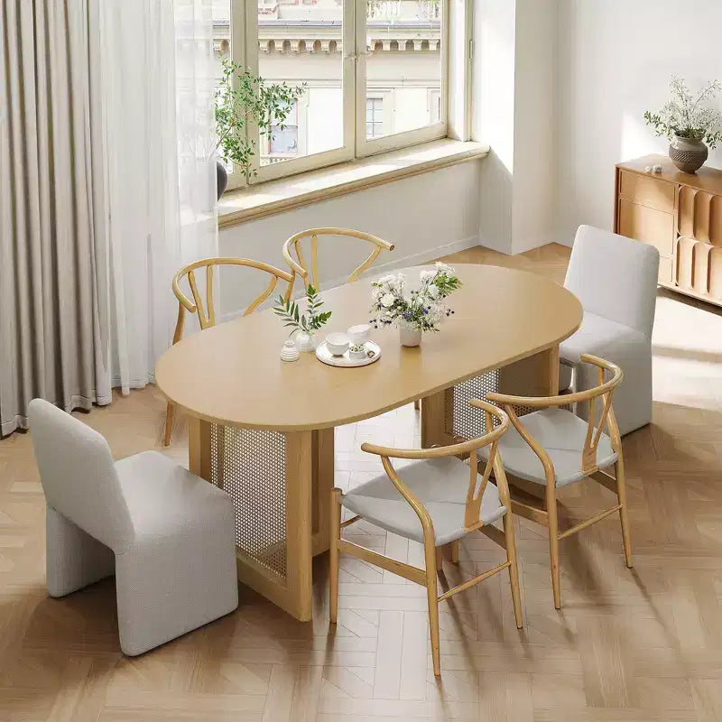 Table à manger ovale Dovelina noire avec double piédestal en rotin pour 6 personnes, 67 po.
